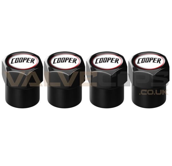 This image shows a set of four Cooper Black Anodised Valve Caps