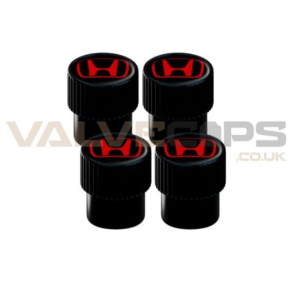 A set of 4 black fluted tyre valve caps with the red Honda logo