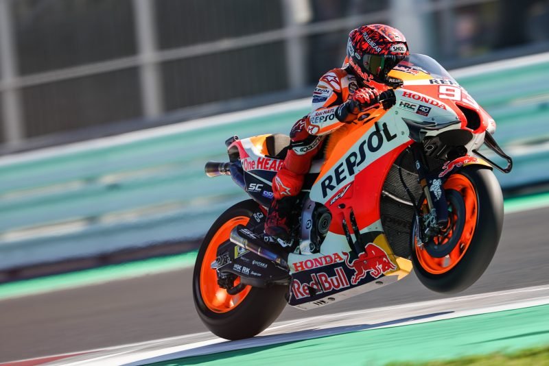 This photo shows Marc Marquez riding his Repsol Honda Moto GP bike on track